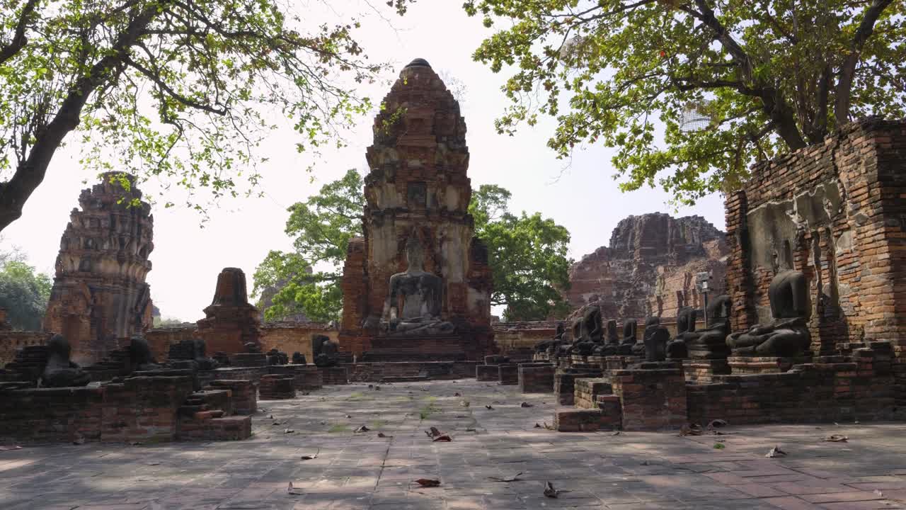 Slow motion slider across stunning buddhist ruins in Ayutthaya, Thailand