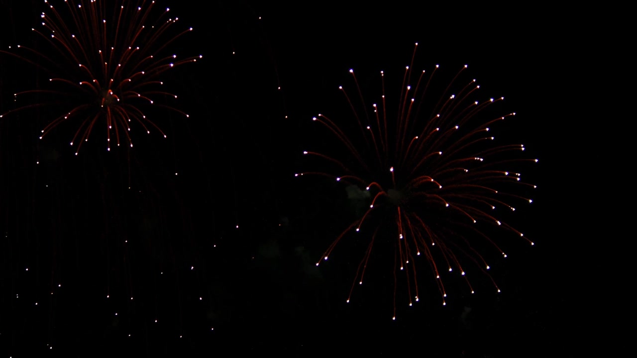 Spectacular Coastal Display. Night Sky Illuminated by Fireworks