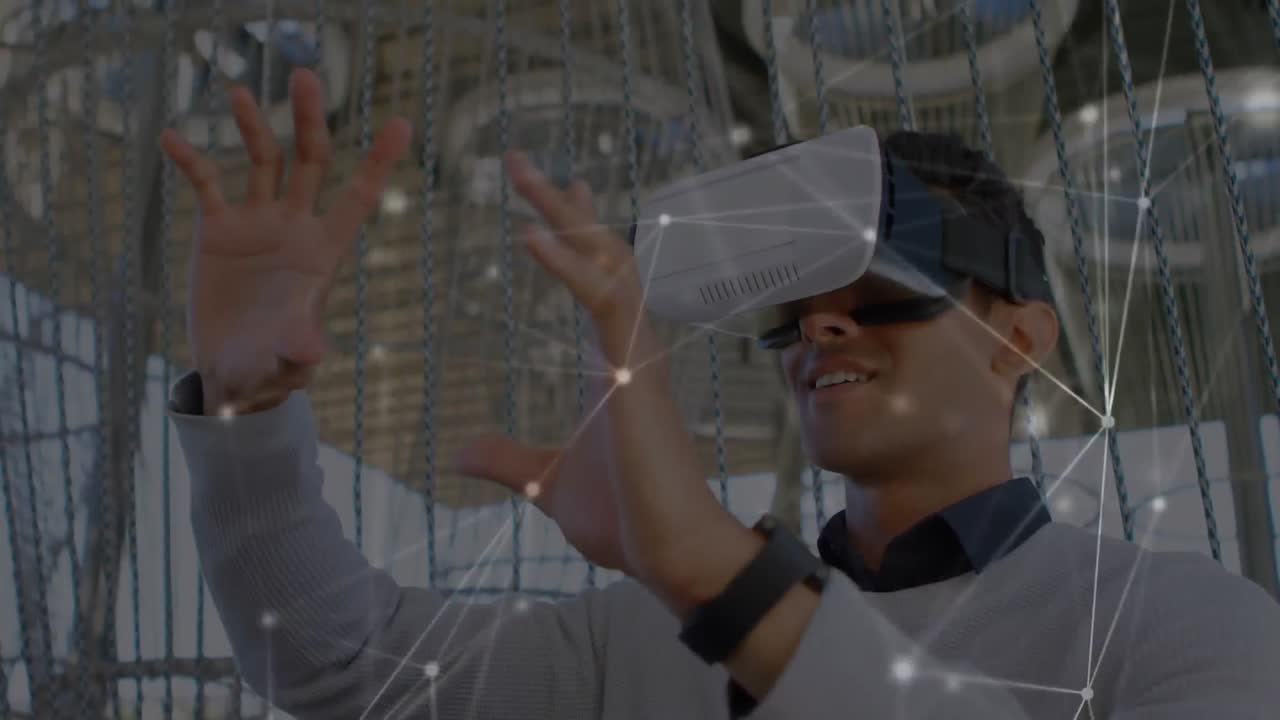 Animazione di una rete di connessioni sopra un uomo d'affari che indossa visori VR