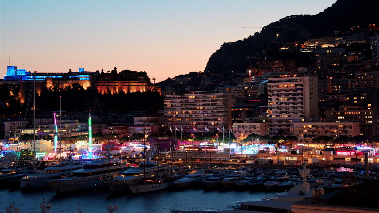 Aerial view of the Port Hercule Funfair in Monaco in the evening