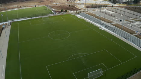 Aerial-view-of-empty-soccer-field-during-the-spring