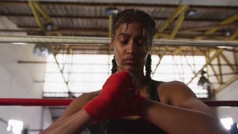 Mixed-race-woman-wrapping-her-hands