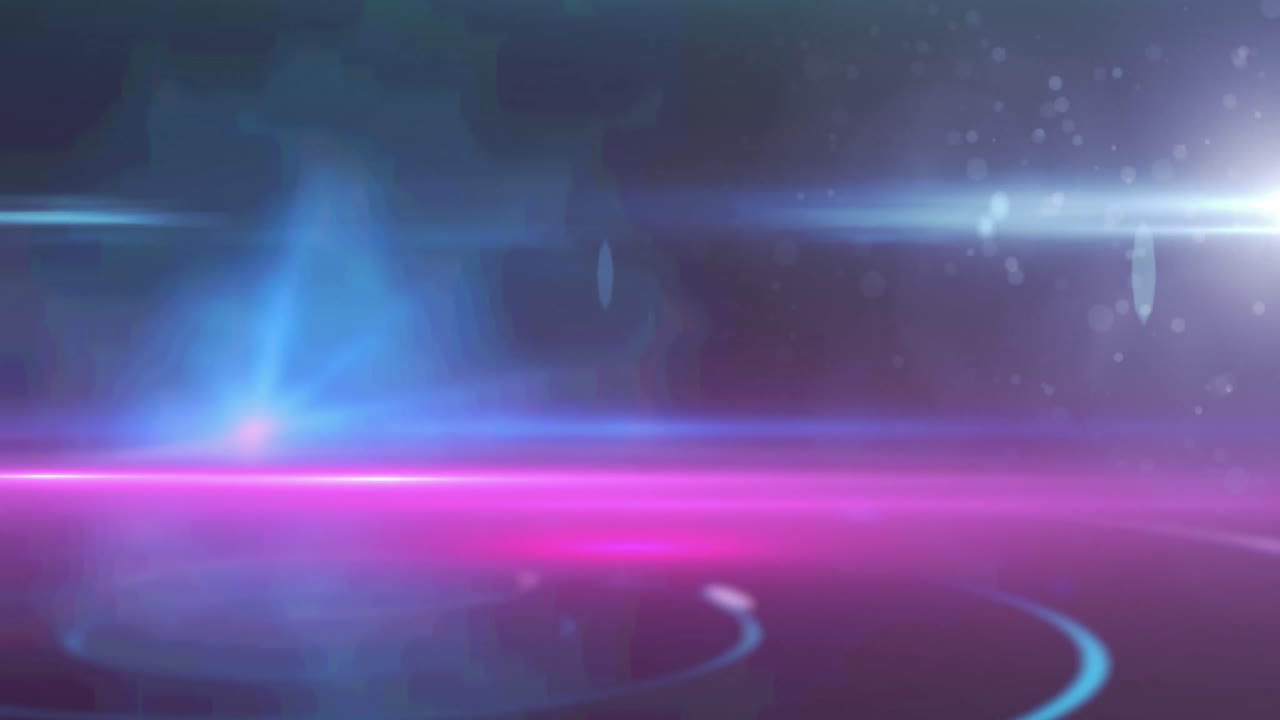 Animation of glowing spots of light shimmering on blue to purple background