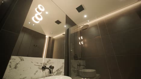 stylish and elegant minimalist home interior featuring clean lines, neutral colors, and warm ambient lighting, creating a cozy and modern atmosphere.