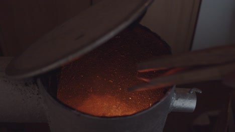 Opening-Lid-Steel-Wood-Burning-Stove-Flames-Showing-Up