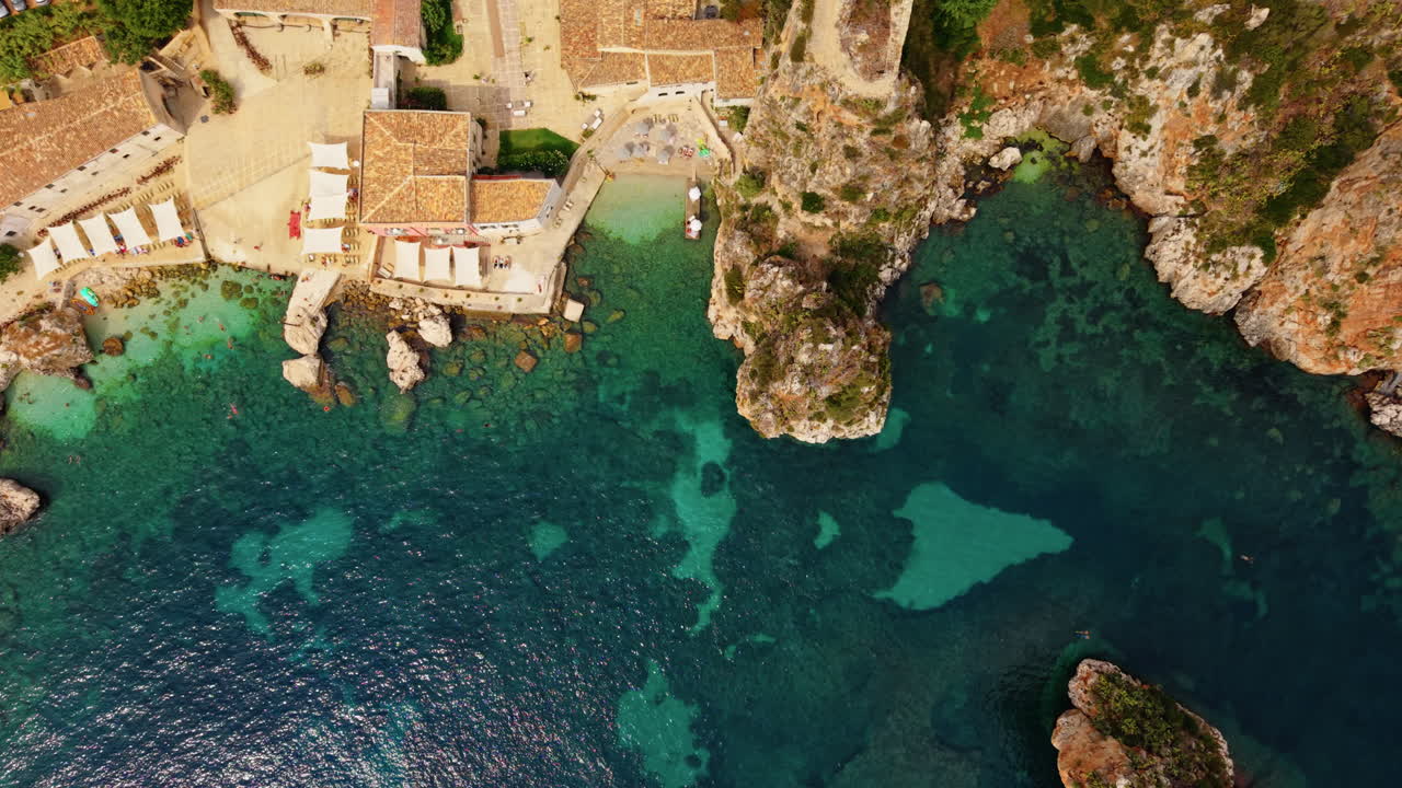 Above View Of Walled Medieval Tuna-fishing Estate, Tonnara di Scopello In Scopello, Trapani, Italy. Aerial Topdown Shot