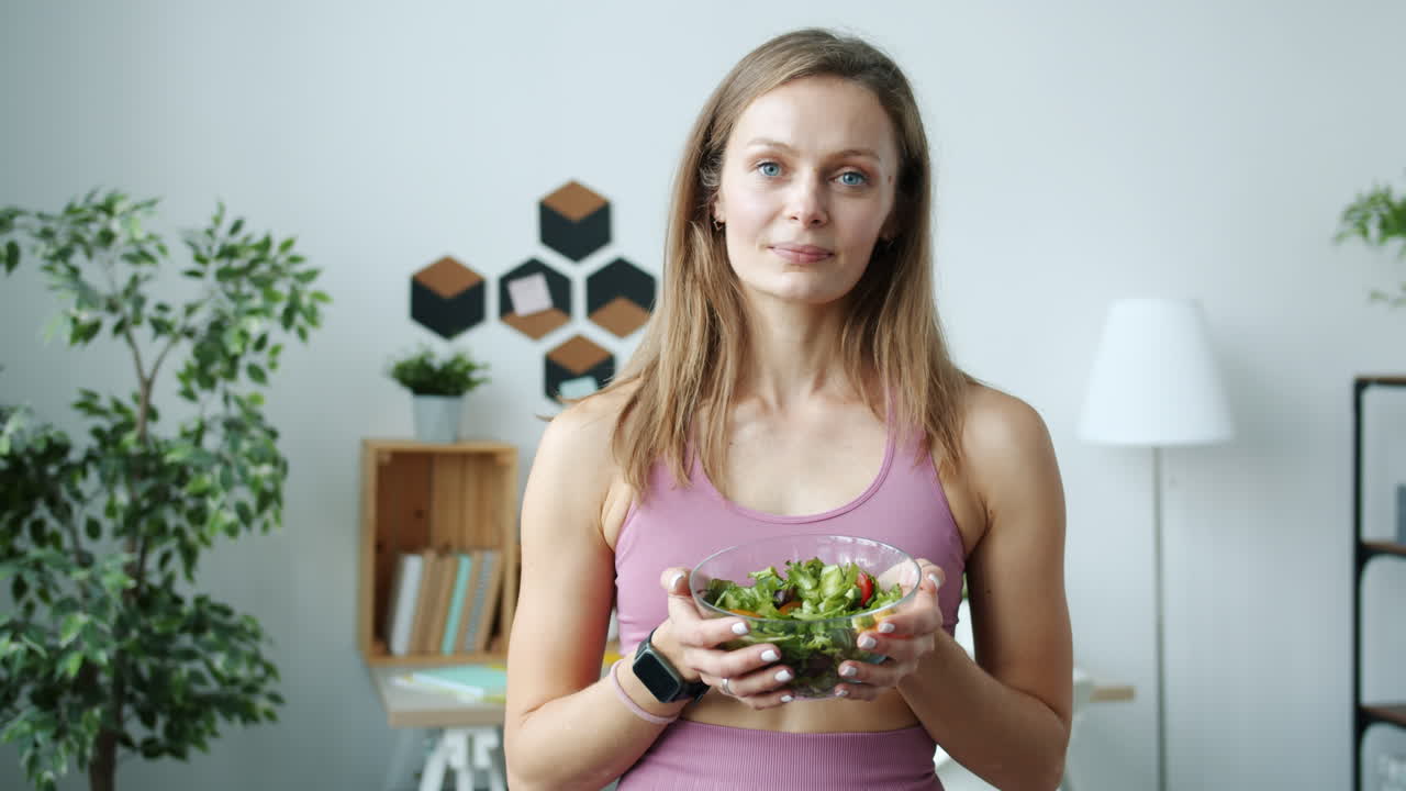 Woman holding a salad bowl