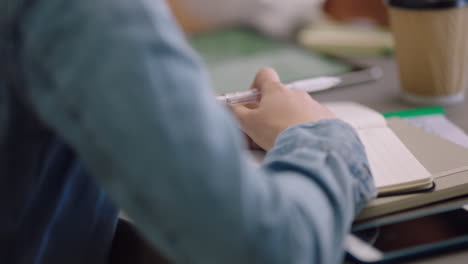 hands, writing and notebook with a woman planning