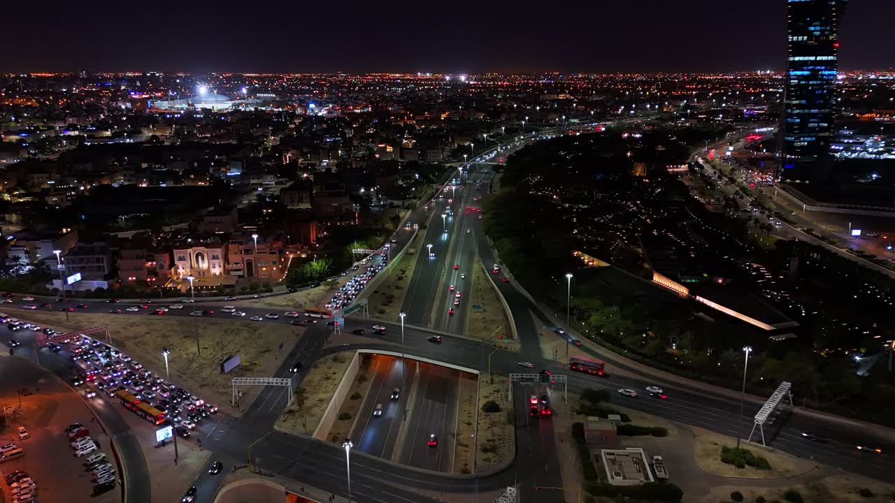 Stunning 4K timelapse of Kuwait City showing vibrant highway traffic, glowing towers, and night city energy. Ideal for urban, travel, or infrastructure-related content.