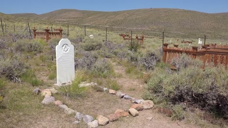 a gravestone of a pioneer settler in bodie california from the gold rush western era