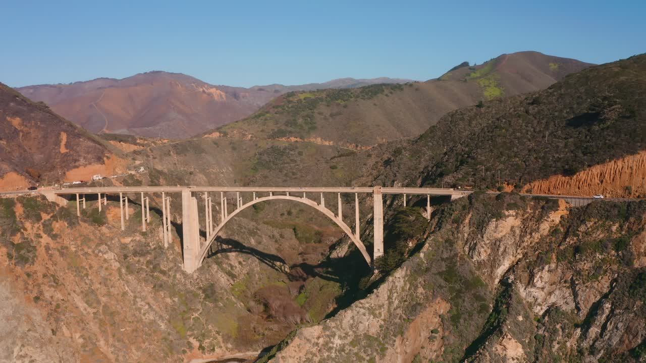 Aerial of the bixby creek bridge to reveal the California coastline