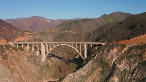 aerial of the bixby creek bridge to reveal the california coastline