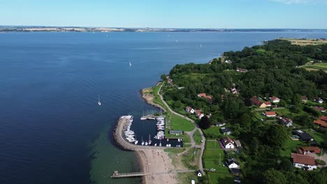 ven island, sweden: drone zooming out of the port of norreborg