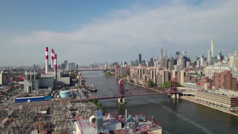 industrial-looking aerial of nyc skyline with generating plant in foreground