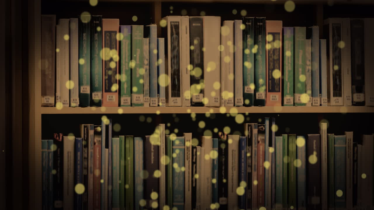 Animation of glowing spots over books on shelf