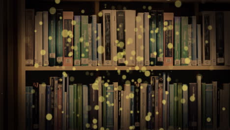 animación de manchas brillantes sobre los libros en la estantería
