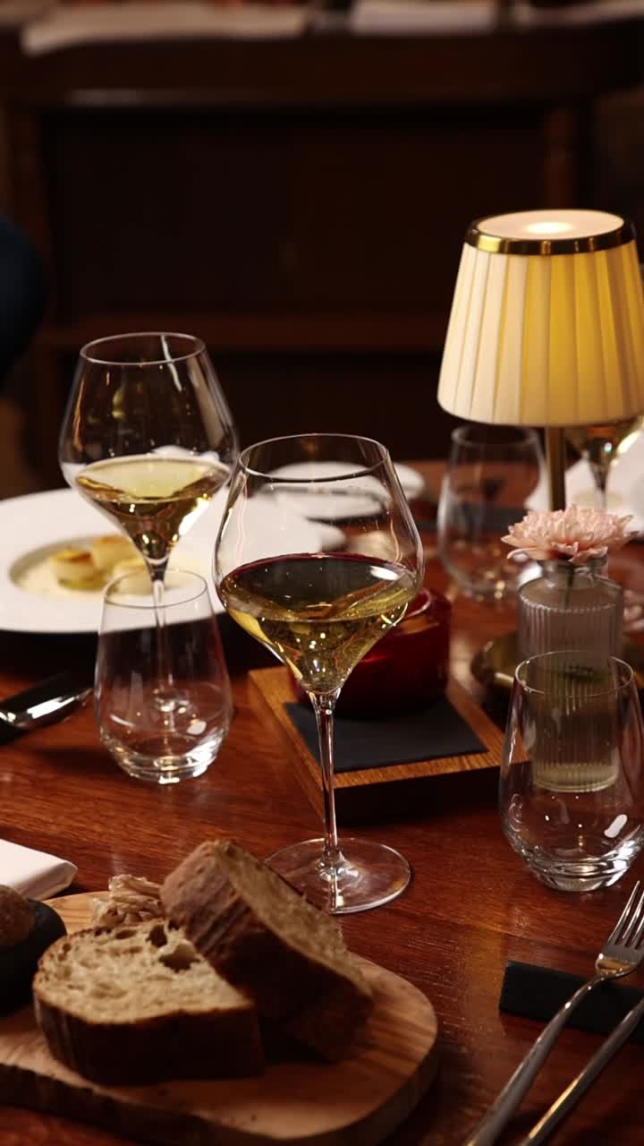 A Beautiful Table Setting with Wine and Bread