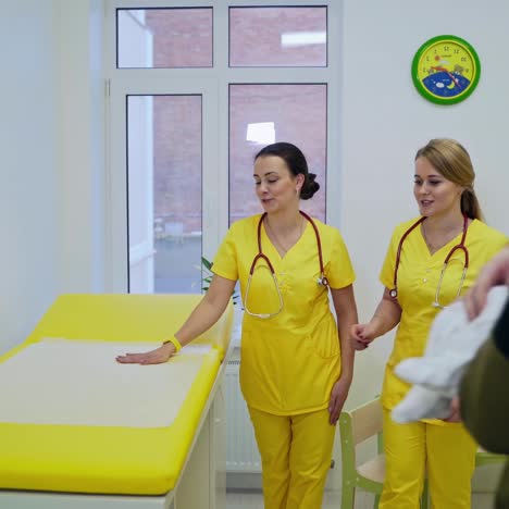 doctor examining little patient. doctor examines little child in hospital