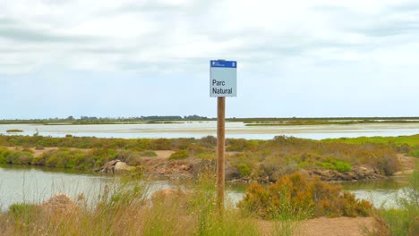 Pan-shot-over-the-wetland-areas-of-Ebro-delta-in-Catalonia,-Spain-on-a-cloudy-day