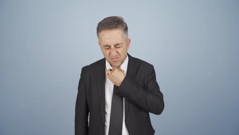 hombre de negocios que sufre de dolor de garganta.
