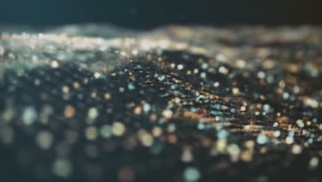 a captivating exploration of vibrant data waves: a stunning visual journey through sparkling particles and dynamic patterns in a darkened space