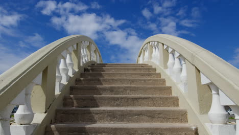 stone stairs and blue sky in aveiro, portugal - low angle shot