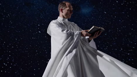 priest reading a book in the cosmos