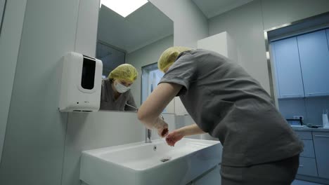 preparing for surgery operation, the doctor washes hands before surgery