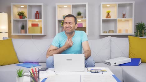 home office worker man is sick and coughing.
