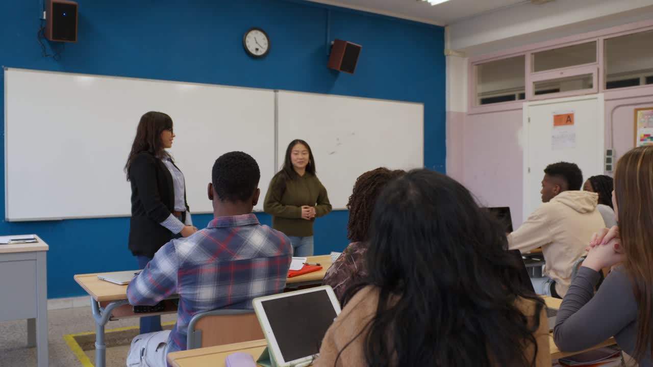 Classroom presentation with students and teacher