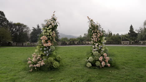 floral wedding arch in a garden