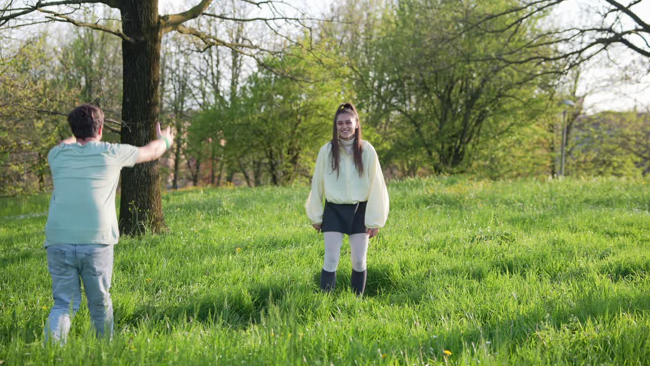 Couple walking in a park in spring