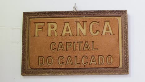 Signboard-made-of-leather-of-Franca-the-capital-of-Shoes,-on-Jose-Chiachiri-Museum