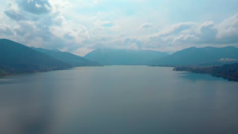 slow aerial pan, tegernsee on a cloudy day seen from high up