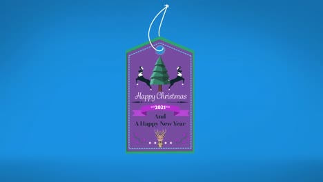 animation of christmas logo with christmas text over blue background