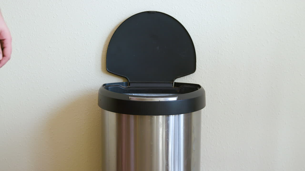 Man Throws Away Milk Jug in Motion Sensing Touchless Trash Can - Medium