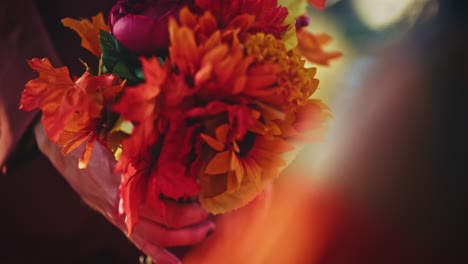 autumnal bouquet held in hands