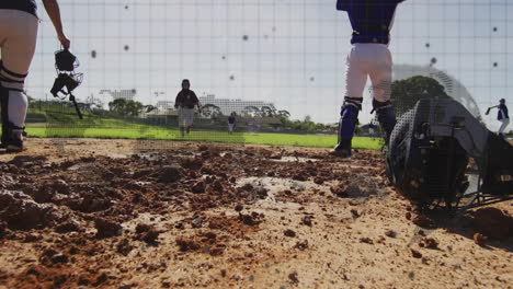 catchers squatting behind plate as runner sprinting on sports diamond, with animated speed graph
