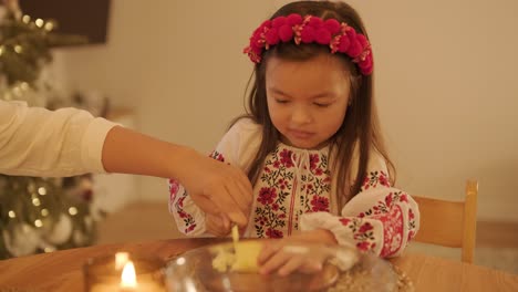 mother and daughter preparing for christmas celebration