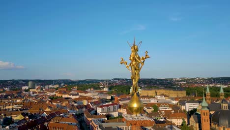 4k aerial drone video of the ornate steeple of st mary's chapel in downtown würzburg, germany