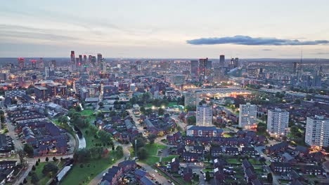 aerial forward view of manchester city at evening, england