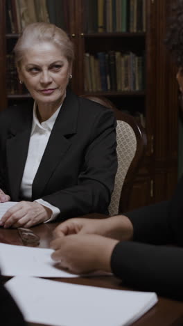 business meeting in a library