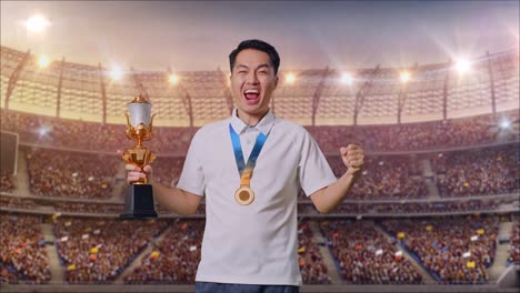 man celebrating victory with trophy and medal in a stadium