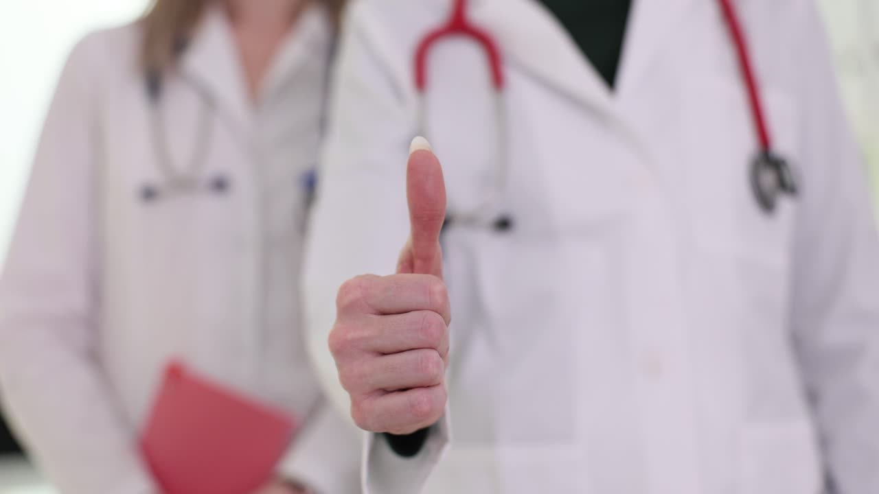 Doctors Giving Thumbs Up