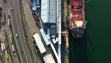 bird's eye view of geared container vessel moored at batumi seaport in adjara, georgia