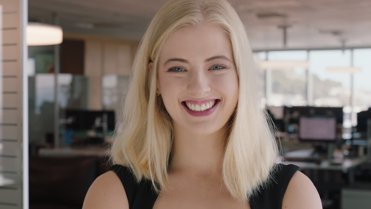 portrait young blonde business woman laughing female office manager enjoying successful career in corporate management professional at work
