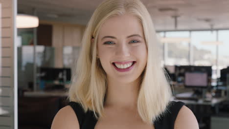 portrait young blonde business woman laughing female office manager enjoying successful career in corporate management professional at work