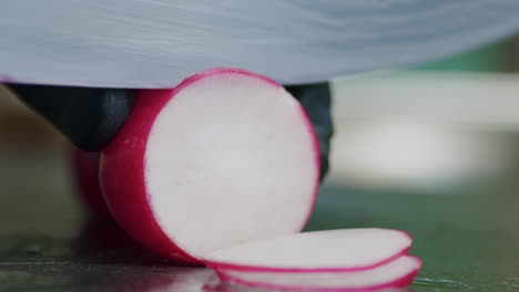 close-up of slicing fresh radish