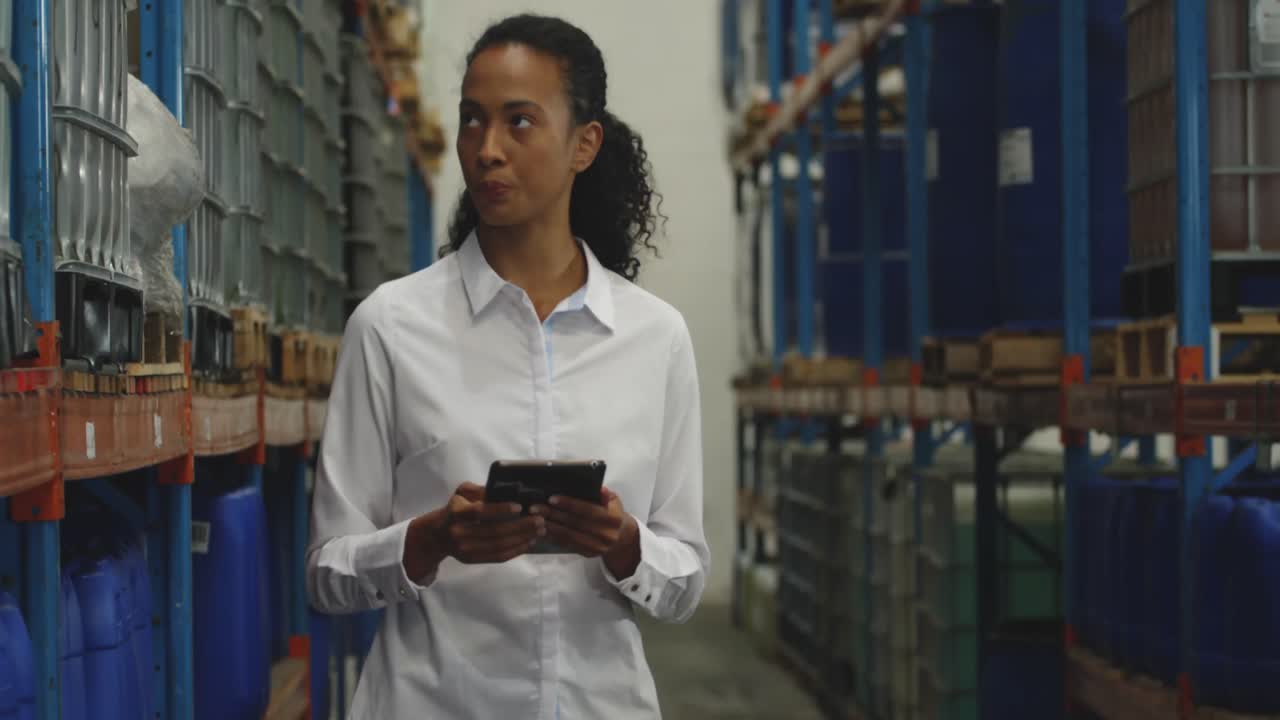 Young female manager in a warehouse