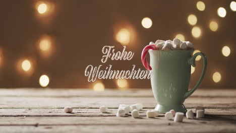 animation of frohe weihnachten text over mug of chocolate with marshmallows and spots of light